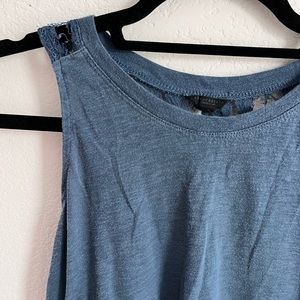 A dark blue tank top with a mesh back.